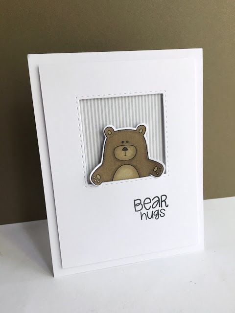 a card with a teddy bear in the center and words bear hugs written on it