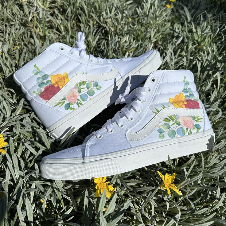 Get ready for spring with these cute rose flower design Sk8-Hi Vans. We buy each pair of shoes BRAND NEW. Each pair is made to order, please make sure you put in the correct shoe size before you check out. The ink is permanent and will never come off, fade away, or peel off. Made in the USA. This price includes everything: shoes, artwork, and shipping. Thanks for stopping by our Etsy shop! Please message me with any questions! Because the artwork is custom made for you, there are no exchanges or returns. If you have any issues with your order, please feel free to reach out to us and we will be more than glad to help you! Please know your size before ordering. Sizes listed are in US sizing scale. Please note that colors of actual item may slightly differ from what you see on your screen due Spring Casual Sneakers With Floral Applique, Casual Sneakers With Floral Applique For Spring, Casual Floral Applique Sneakers For Spring, Rose Flower Red, Custom Slip On Vans, Hand Painted Heels, Custom Vans Shoes, Theme White, Sk8 Hi Vans