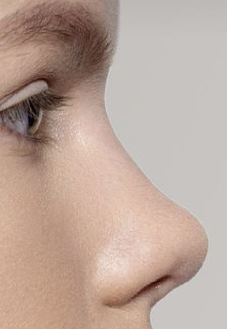 a woman's nose is shown with the tip of her nose slightly bent up