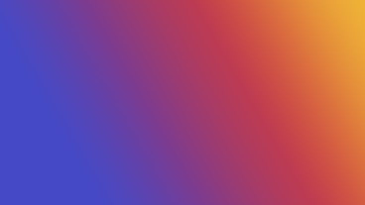 a blurry image of an orange, pink and blue background