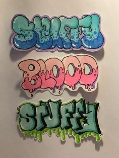 three stickers with different colors on them that say booo, booo, and sushi