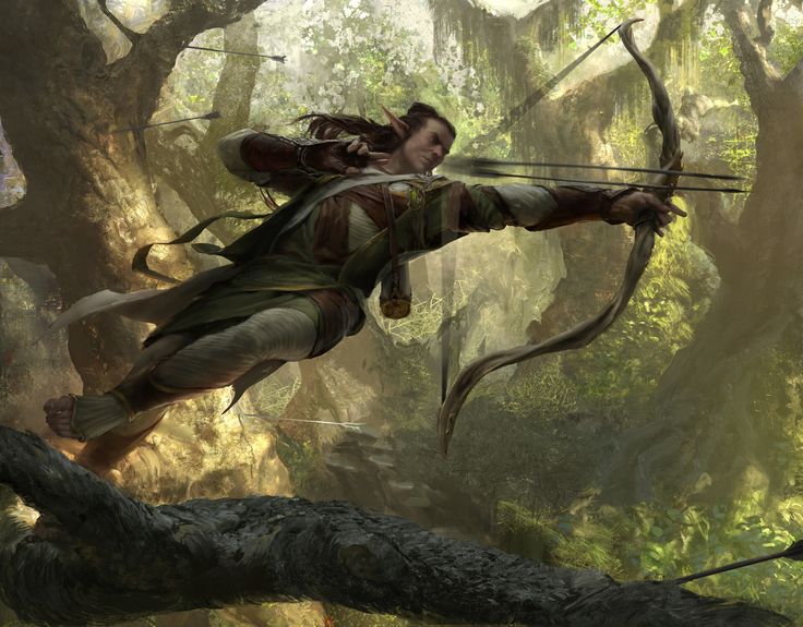 a man with bow and arrow aiming in the air over a tree covered forest area