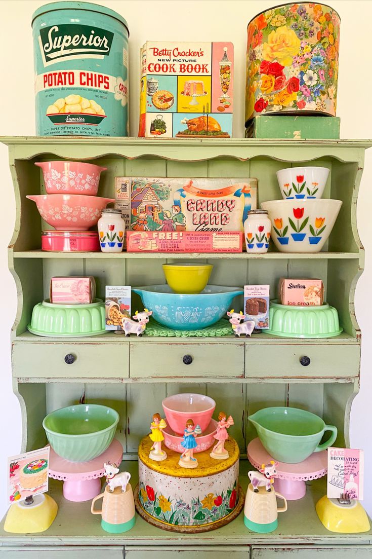 a shelf filled with lots of colorful dishes