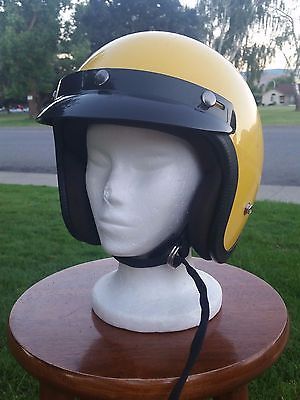 a helmet is sitting on top of a mannequin head