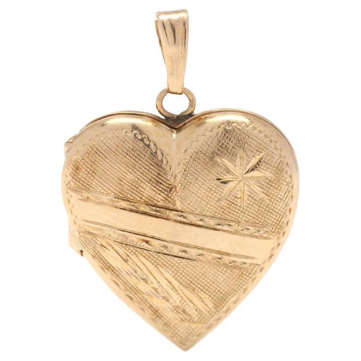 This exquisite 14K yellow gold locket pendant is the perfect way to express your love. Intricately engraved with a heart design, this small gold locket measures 7/8 inch in length. The simple, elegant style of this small gold locket makes it an ideal gift for any special occasion. With its timeless design, this gold heart locket is sure to become a cherished keepsake. Length: 7/8 in. Width: 1/2 in. Weight: 1.1 dwts. / 1.7 grams Stamps: 14K Ring Sizings & Modifications: *Please reach out before y Gold Heart Locket, Heart Pin, Gold Locket, Gold Engraving, Heart Locket, Simple Elegant, Gold Heart, Heart Of Gold, Heart Design