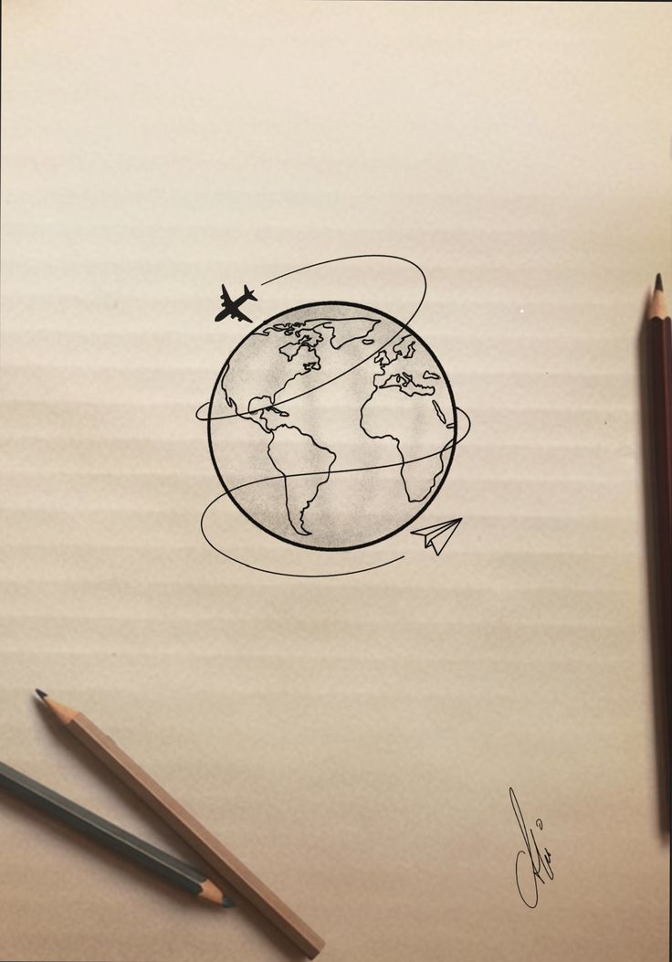 a drawing of an airplane flying around the world on paper with pencils next to it