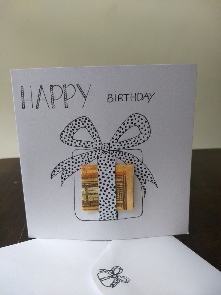 a happy birthday card with two pieces of cake in the shape of a gift box