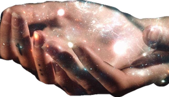 two hands holding each other with stars in the background