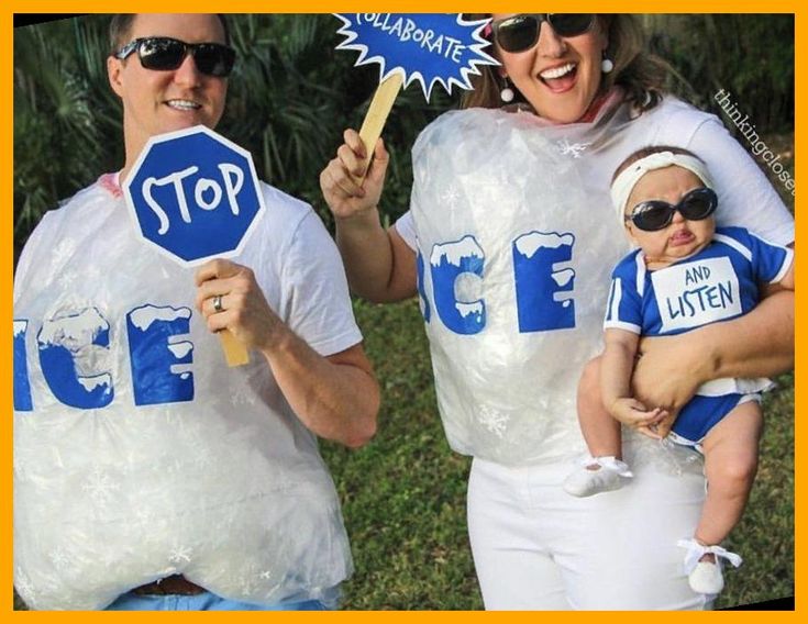 two people in costumes holding up stop signs and eating popsicle sticks while standing next to each other