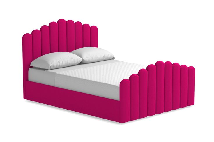 a bed with pink headboard and pillows on top of it, against a white background