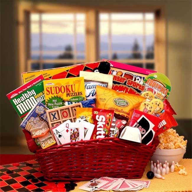 a red basket filled with snacks on top of a table