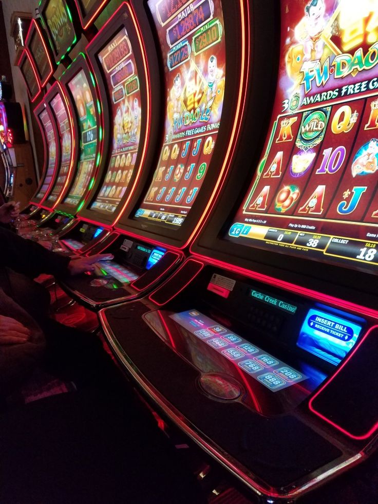 several slot machines are lined up in a row