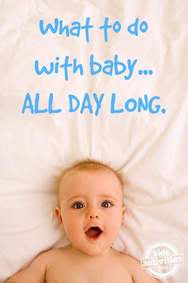 a baby laying on top of a bed with the words what to do with baby all day long