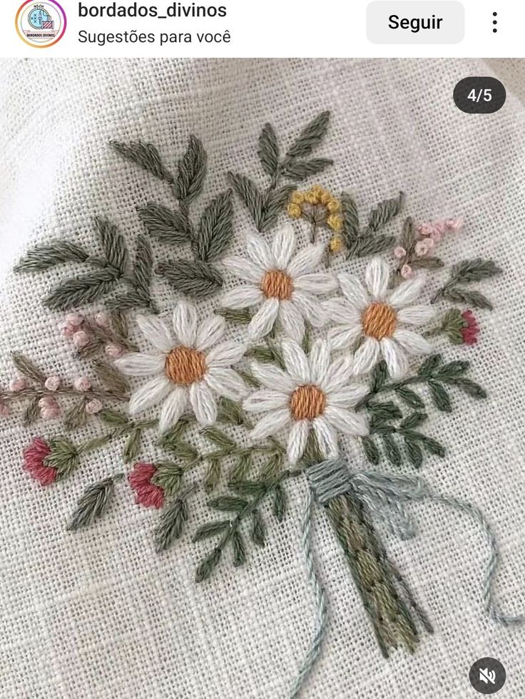 a cross stitch pattern with flowers on it