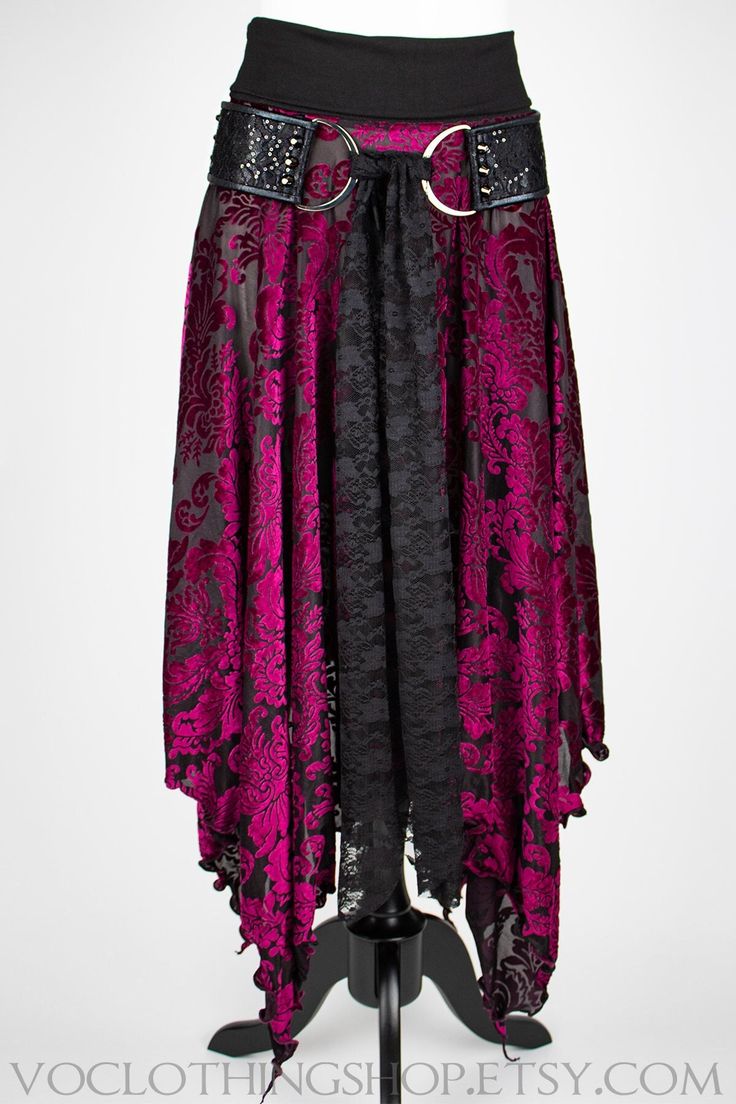 Super soft and semi-sheer BLACK VELVET BURNOUT maxi skirt with lots of fullness and a witchy, pointed petal edge hem. Wide cotton spandex fold-over waistband sits just below your natural waistline, or you can pull it down over your hips for extra length. 100% Handmade in Los Angeles, CA USA. SIZES (designed to fit the following body measurements): XS :: fits 24"-25" waist S :: fits 26"-28" waist M :: fits 29"-31" waist L :: fits 32"-35" waist XL :: fits 36"-39" waist XXL :: fits 40"-44" waist Wa Long Flowing Skirt Outfits, Black Gothic Velvet Bottoms, Black Velvet Gothic Bottoms, Bohemian Fitted Skirt For Halloween, Black Lace Skirt For Costume Party, Gothic Boho Fashion, Witchy Summer Outfits, Goth Hippie Outfits, Witch Skirt