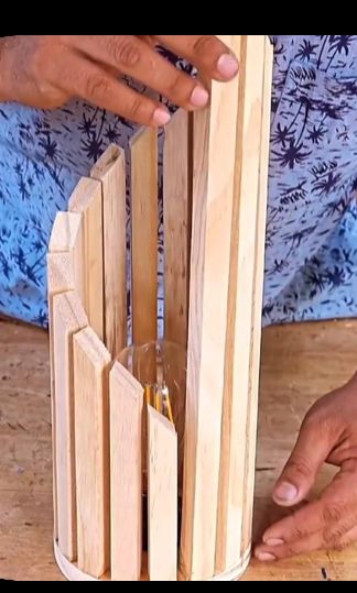 a person is working on some kind of wooden structure with woodworking tools in it