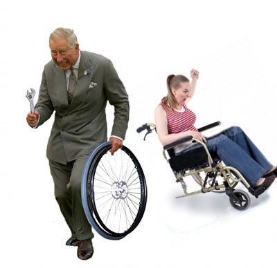 a man in a suit pushing a wheel chair next to a woman in a wheelchair