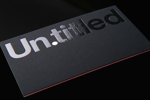 an untidled business card with the word untiffed on it's side