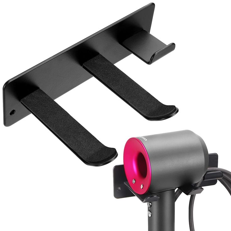 two black and pink lights are on top of a tripod holder with one light attached to it