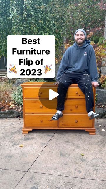 a man sitting on top of a wooden trunk with the words best furniture flip of 2013