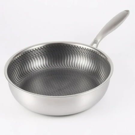 a stainless steel frying pan on a white background