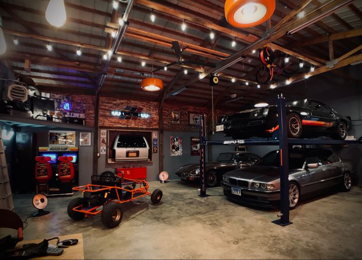 a garage filled with lots of different types of cars