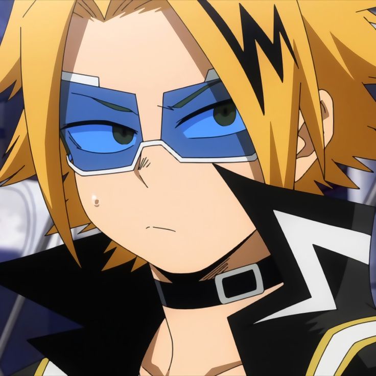 an anime character with blonde hair and blue eyes looking at the camera while wearing goggles