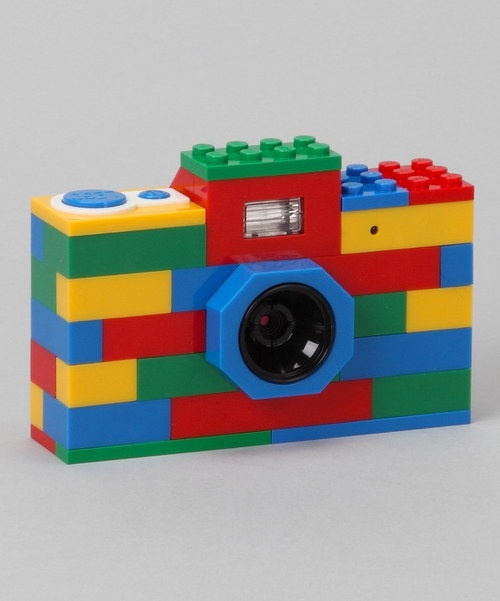 a toy camera made out of legos