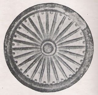 an old photo of a wheel with spokes on it's rim, from the early 19th century