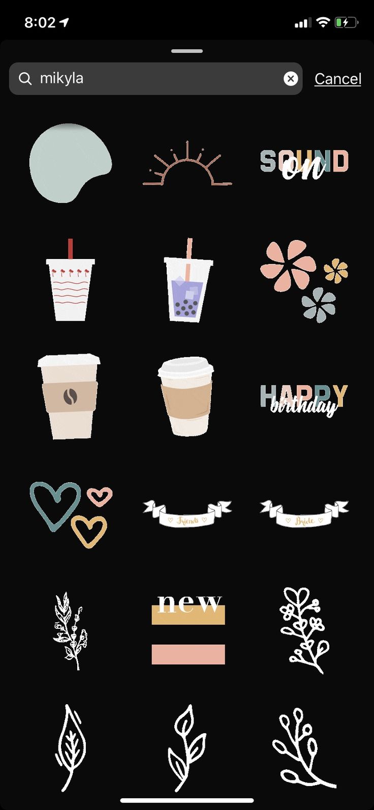 an iphone screen with various stickers on the back and side of it, including coffee cups