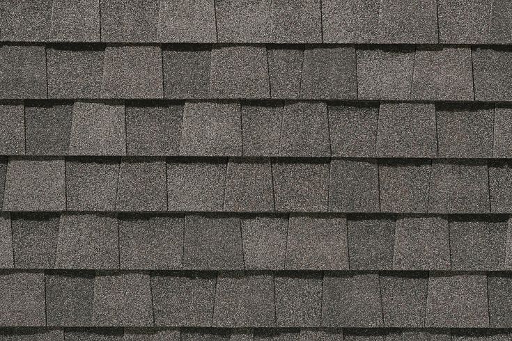 the roof of a house with gray shingles