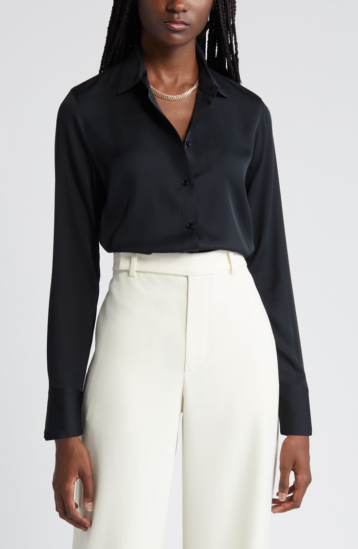 This versatile button-up blouse is irresistibly updated in luxe stretch silk with easy-moving back pleats and a tuckable high/low hem. 27" length (size Medium) Front button closure Spread collar Long sleeves with single-button cuffs Back yoke with box pleat 92% silk, 8% spandex Dry clean or hand wash, line dry Imported Individualist Black Blouse Outfit Office, Classic Silk Top For Night Out, Elegant Black Blouse With Shirttail Hem, Sleek Silk Button-up Top, Sleek Silk Blouse With Button Closure, Sleek Silk Top With Button Closure, Sleek Business Casual Blouse With Button Cuffs, Sleek Fitted Blouse With Button Closure, Sleek Viscose Office Blouse