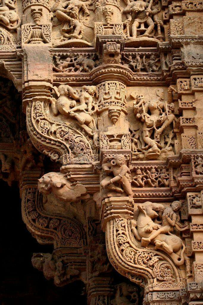 intricate carvings on the side of a building