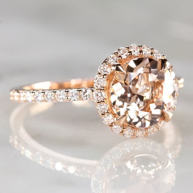 an engagement ring with a fancy brown diamond in the center