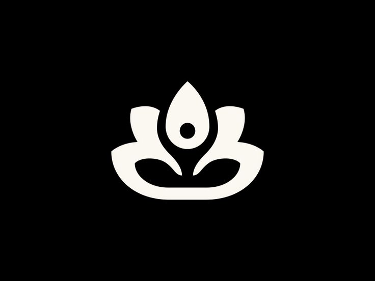 a black and white logo with an image of a flower in the center, on a dark background