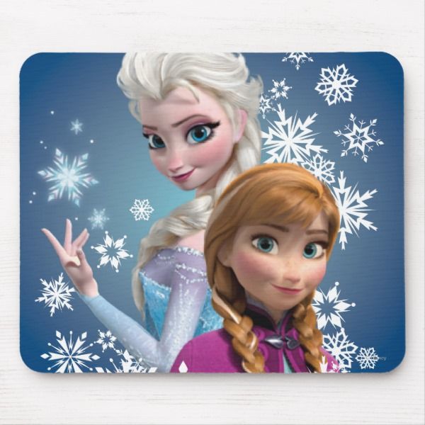 a mouse pad with two frozen princesses on it and snowflakes in the background