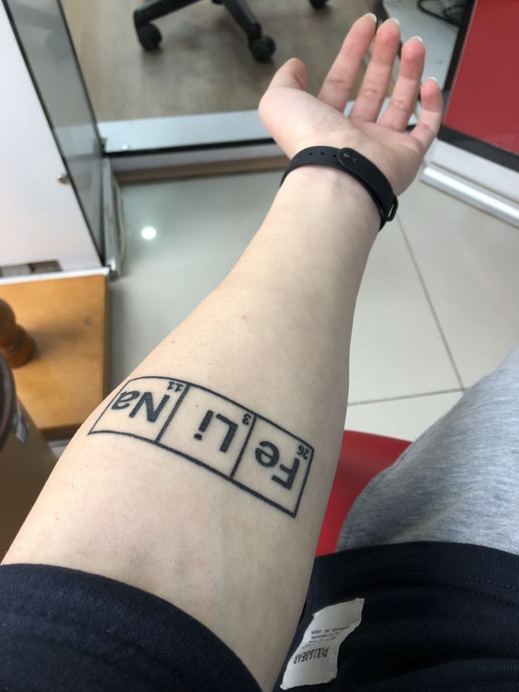 a person's arm with a tattoo on it that reads ferment and is in the middle of their arm