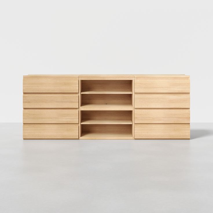 the sideboard is made out of wood and has two open shelves on one side