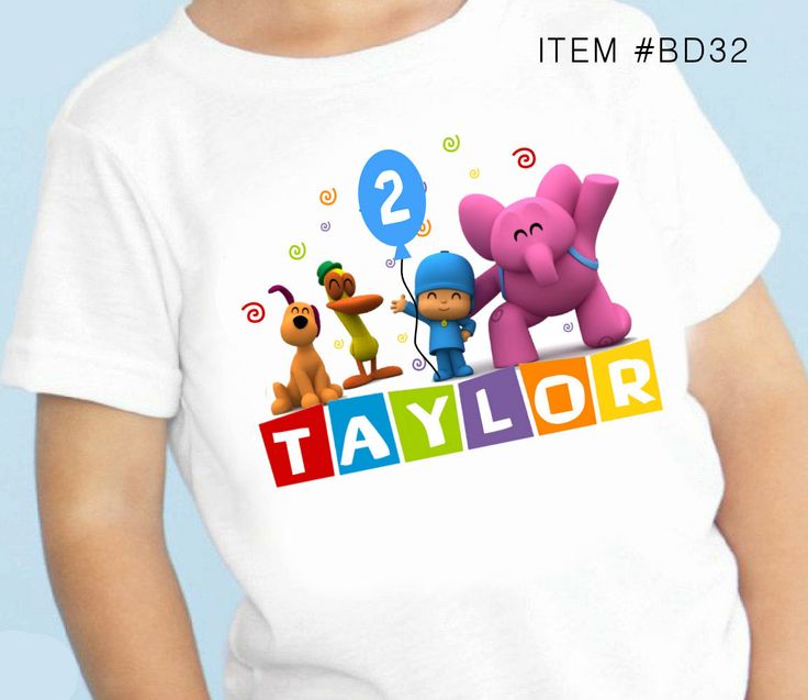 a toddler wearing a t - shirt with the name taylor and two cartoon characters on it