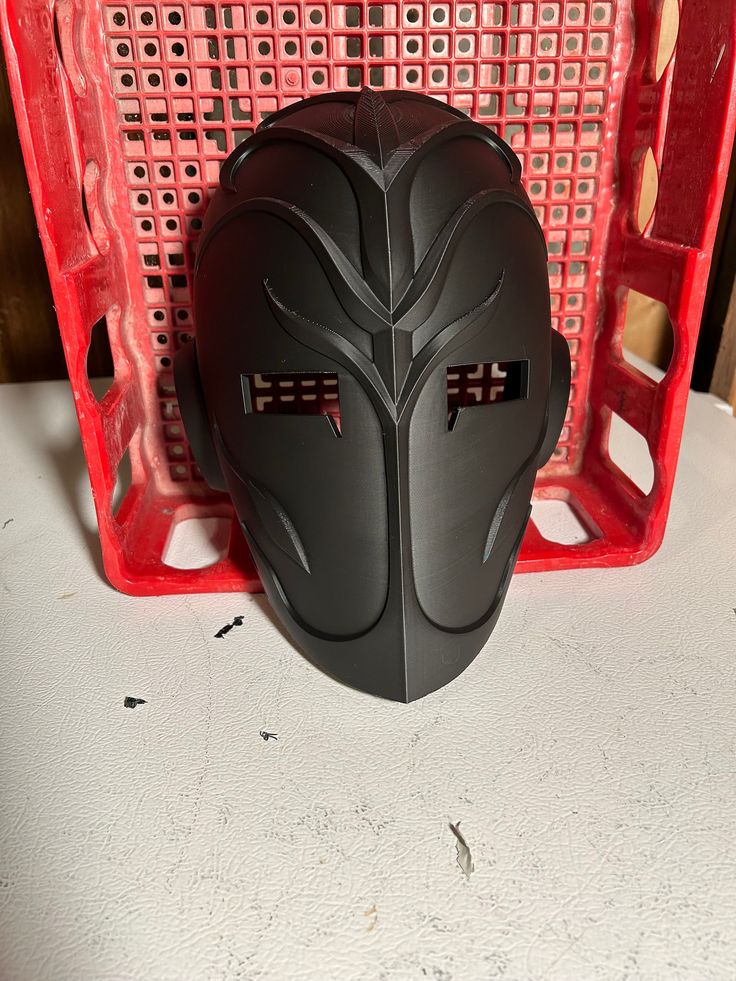 "Raw 3d print of a Jedi Temple Guard Printed in a single piece in durable PLA Mask fits up to 24\" circumference heads Printed in whichever color filament I have on hand - usually black Sanded and Primed option will come sanded smooth to where layer lines are not visible and a coat of primer.  Feel free to msg me about scaling if you don't think it will fit" Star Wars Mask, Jedi Temple Guard, Temple Guard, Star Wars Masks, Jedi Temple, Helmet Concept, Cyberpunk 2077, Diy Kit, Mask Design