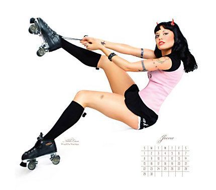 a woman in tights and boots holding a skateboard