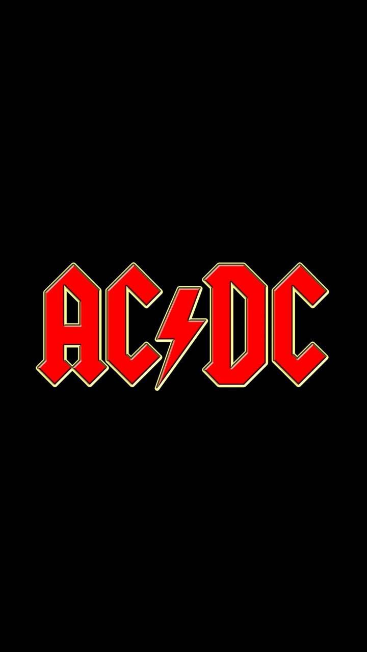 the logo for ac / dc on a black background with red and yellow letters in it