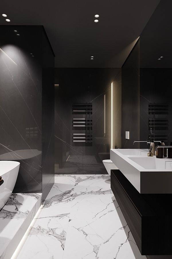 a modern bathroom with marble floors and black walls, along with two sinks on either side of the bathtub