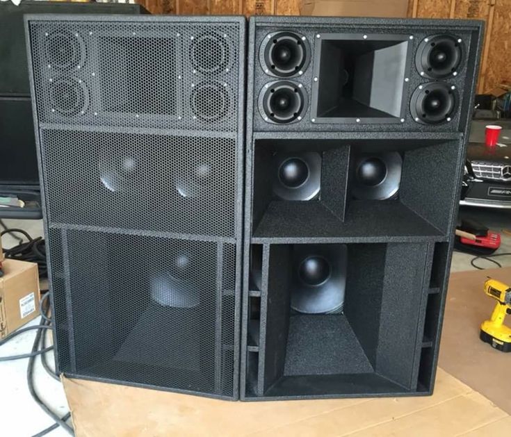 two large speakers sitting next to each other