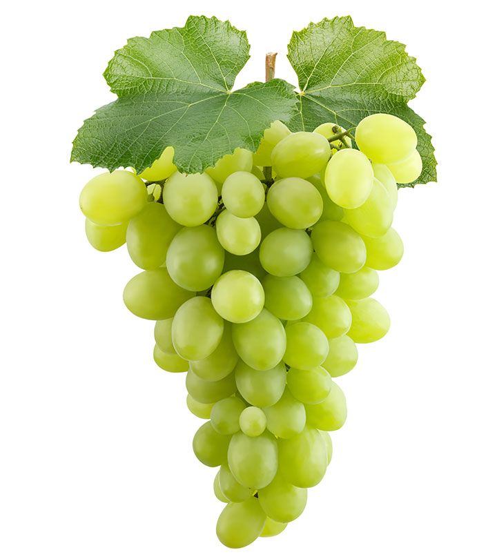 a bunch of green grapes hanging from a vine with leaves on the top and bottom