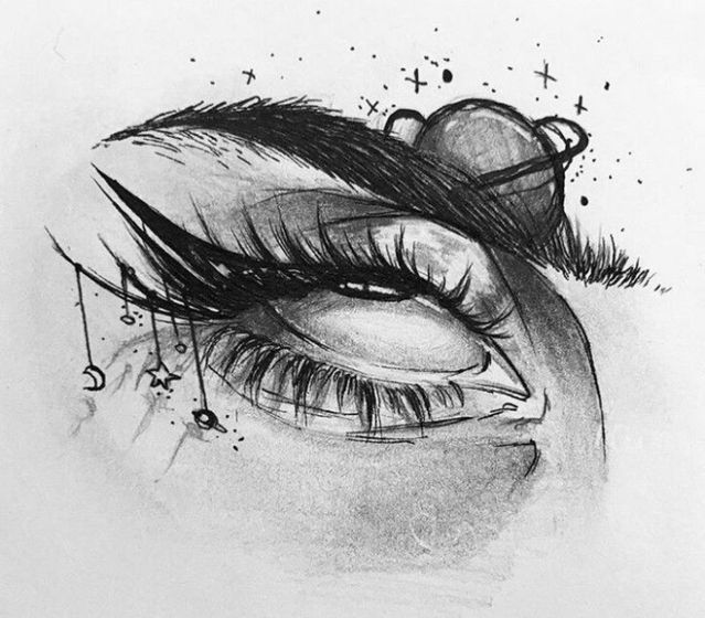 a drawing of an eye with long lashes and stars on the top of its eyelashes