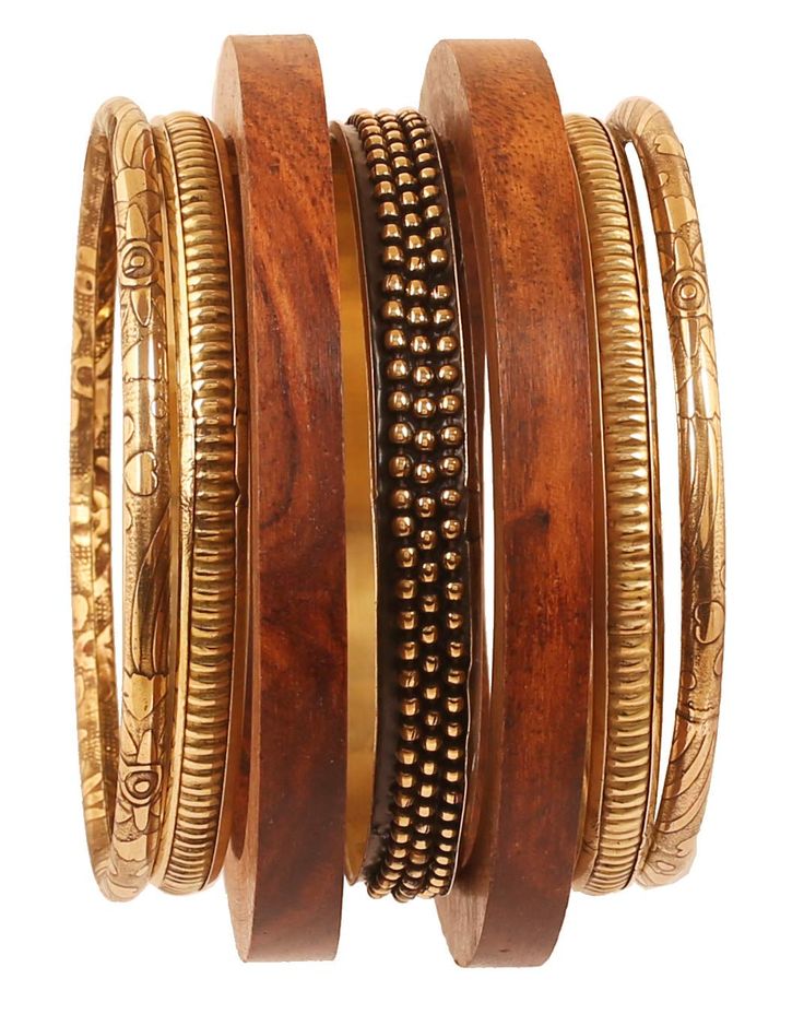 PRICES MAY VARY. Touchstone Indian Bollywood Handcrafted Pretty Assorted Pattern Designer Jewelry Brass And Wooden Xtra Large Bangle Bracelets Set of 7 In Antique Gold And Natural Tones For Women. SIZE : X LARGE. Indian 2-12. Inner Diameter 2.75 Inches or 7 cm. Please check against old Bangle before ordering to avoid disappointment PLEASE CHECK SIZE / DIAMETER OF OLD BANGLE (AND COMPARE) BEFORE ORDERING TO AVOID DISAPPOINTMENT. We offer many sizes from the smallest to the largest including child Bangle Bracelets Gold, African Bangles, Wooden Bangle Bracelet, Wooden Bangle, Heritage Jewellery, Bangle Bracelet Set, Dope Jewelry, Boho Accessories, Indian Bollywood