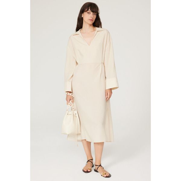 Brown tencel (100% Tencel Lyocell). Hourglass. Long sleeves V-neck. Pull on. 39" from shoulder to hemline. Imported. Cream Long Sleeve Daywear Dress, Cream V-neck Maxi Dress For Daywear, Beige V-neck Cotton Maxi Dress, Long-sleeved Cream Summer Robe, Beige Cotton V-neck Midi Dress, Slouchy Bag, Statement Sleeves, Rent The Runway, Closet Designs