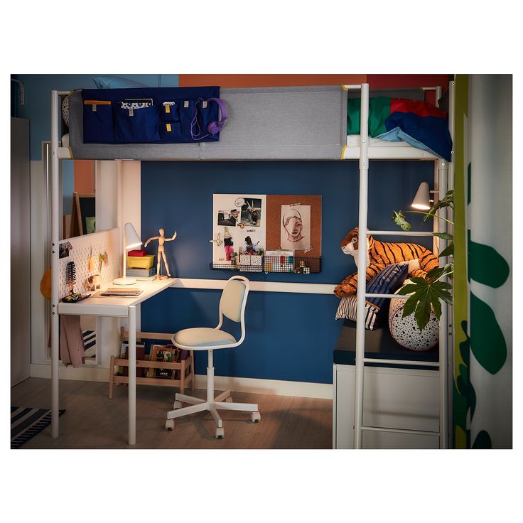 a room with a bunk bed, desk and chair next to a wall that has pictures on it