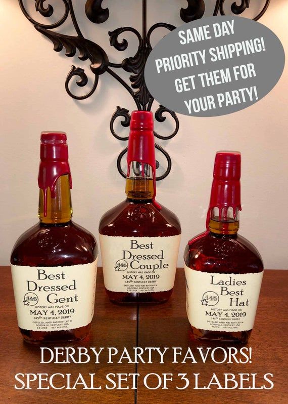 three bottles of liquor sitting on top of a wooden table next to a sign that says best dressed party favors special set of 3 labels